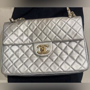 Silver Authentic Chanel Jumbo Bag.